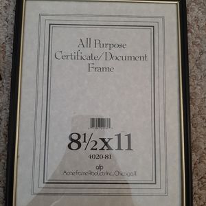 Black plastic with gold trim 8.5"×11" document frame